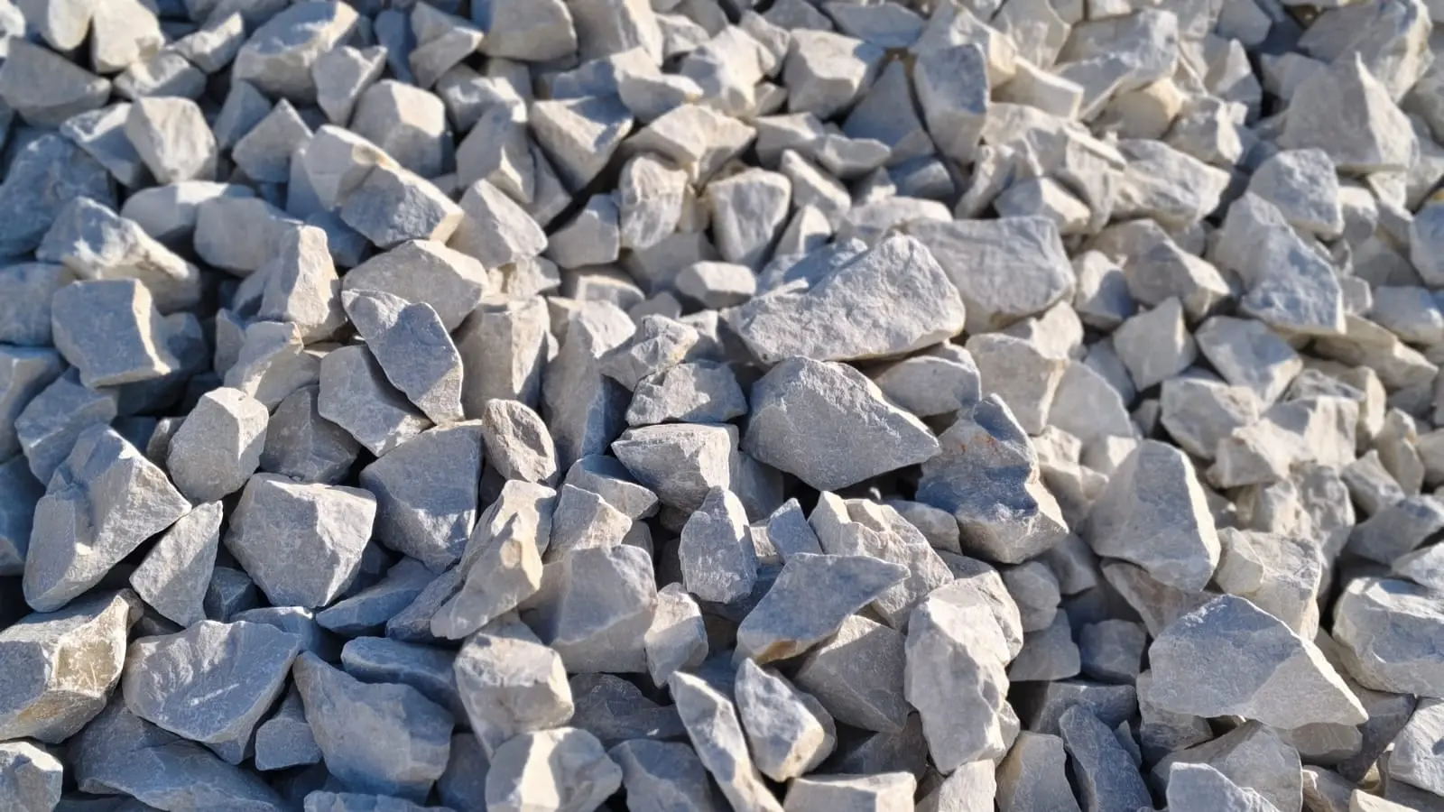A wide pile of angular white and grey dolomite pieces