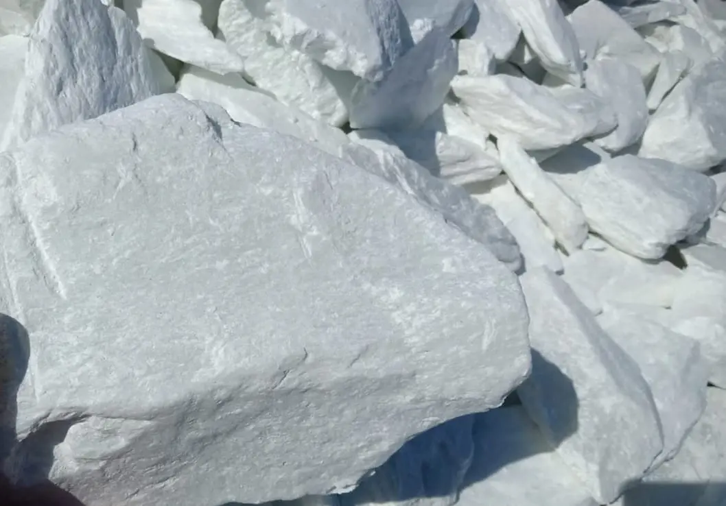Large white talc lumps stacked together