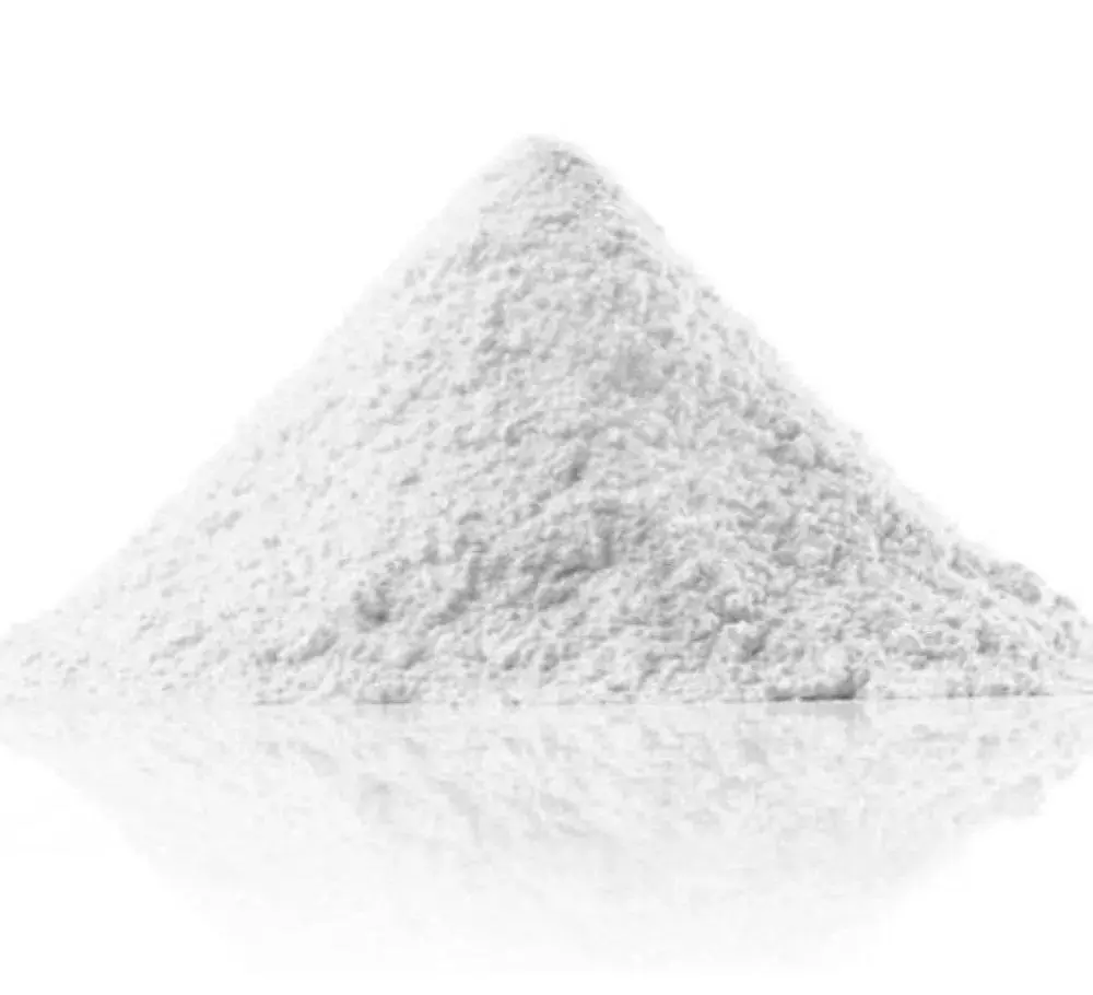 A cone of fine white mineral powder on a white surface